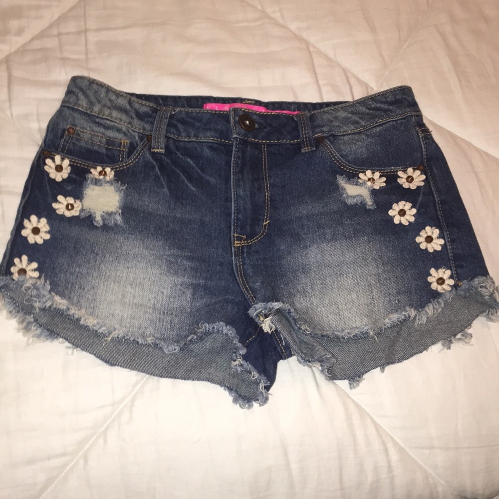 Denim shorts with floral detailing